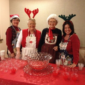 Santa's helpers guarding the Christmas punch!